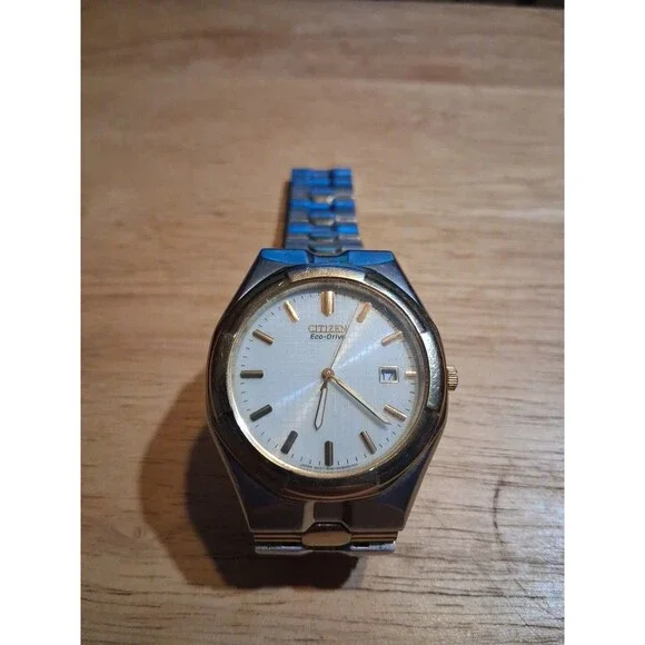 Citizen Eco-Drive E110-S008719 HSB GN-0-S6 Gold / Silver Tone Watch